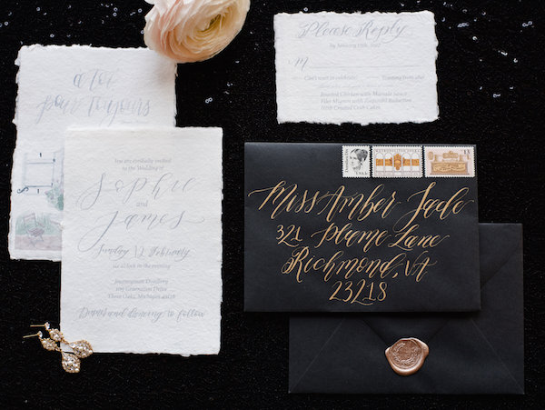 Black and white invitation suite with gold ink