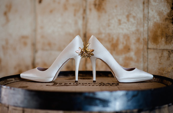 White bridal shoes with gold details