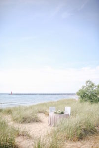 Sweetheart table on sandy beaches of Lake Michigan