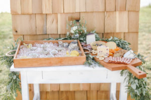 Appetizer table on wood shaker shingle backdrop