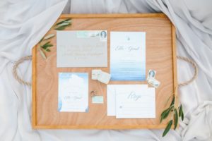Coastal inspired invitation suite with vintage stamps