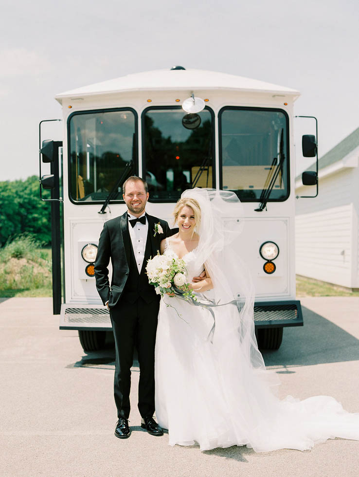 Bride and groom Traverse City wedding transportation