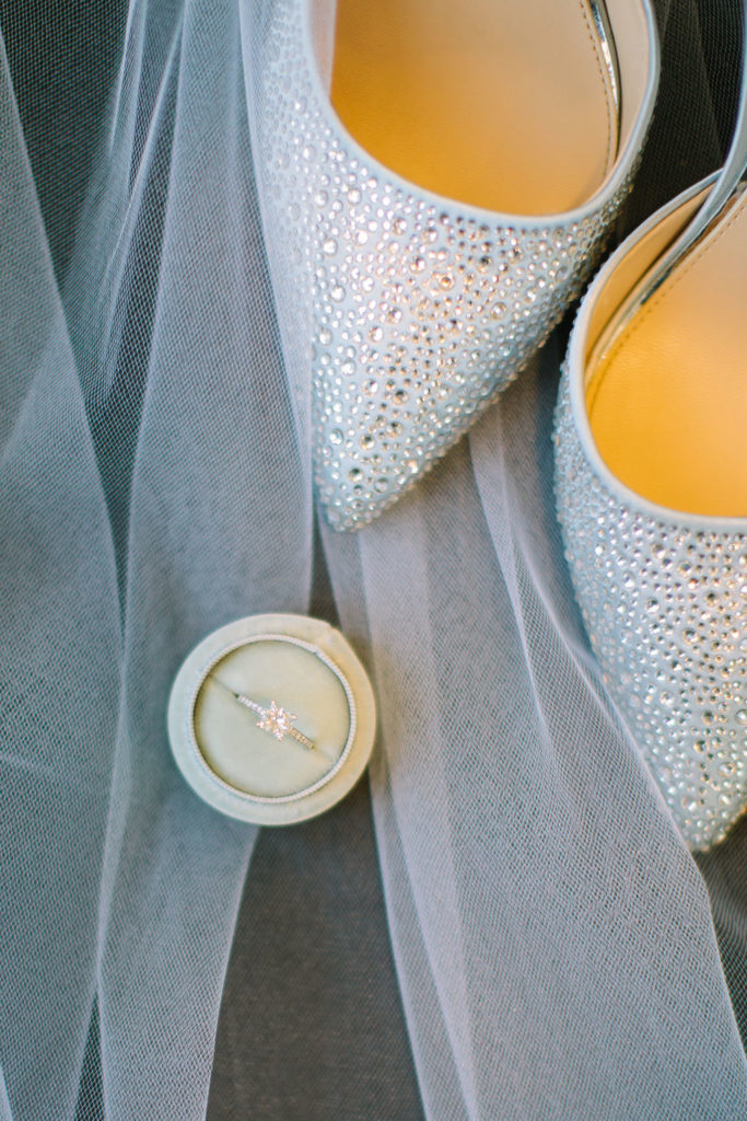 Shoes and wedding ring the morning of a 12 corners vineyard wedding