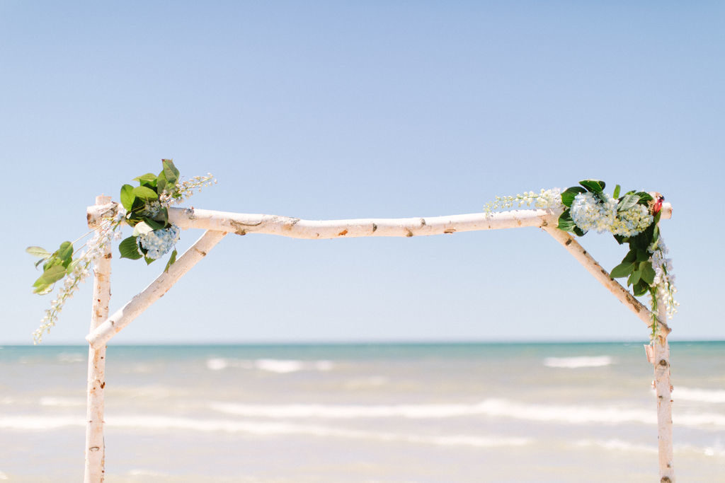 Arbor set-up for a wedding ceremony on the beach in Benton Harbor, MI