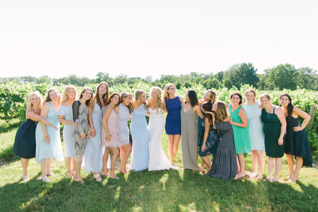 Bridesmaids pose together at 12 Corners Vineyard Wedding