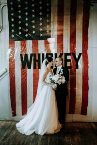 Couple smiling at a Journeyman Distillery wedding