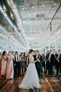 Bride and groom share a first dance at a Journeyman Distillery wedding