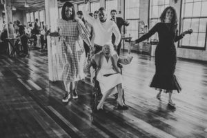 grandmother dancing at a Journeyman Distillery wedding