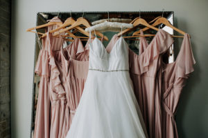 Bridal gown and blush bridesmaids dresses