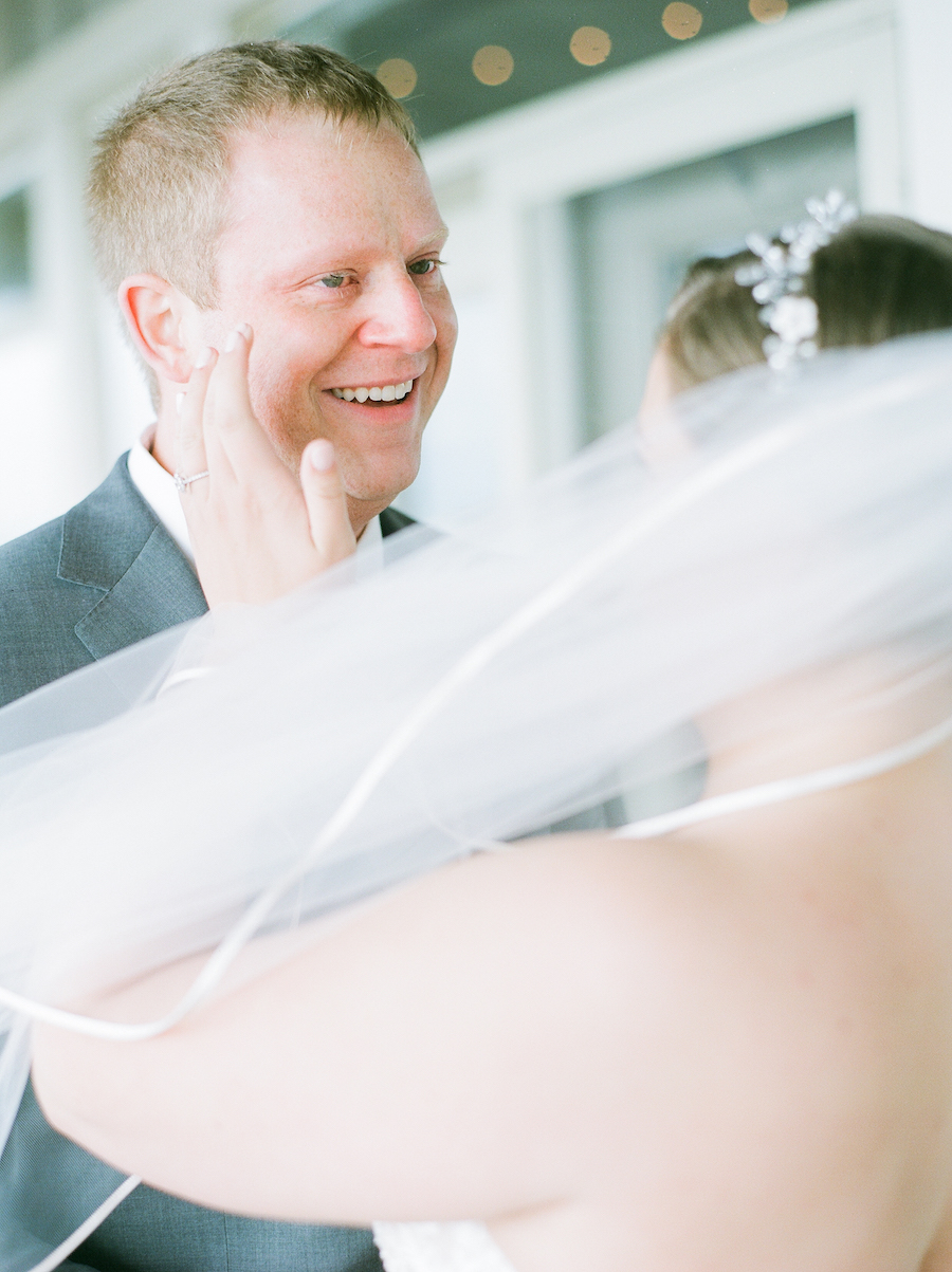 Bride and groom share a first look before their camp blodgett wedding