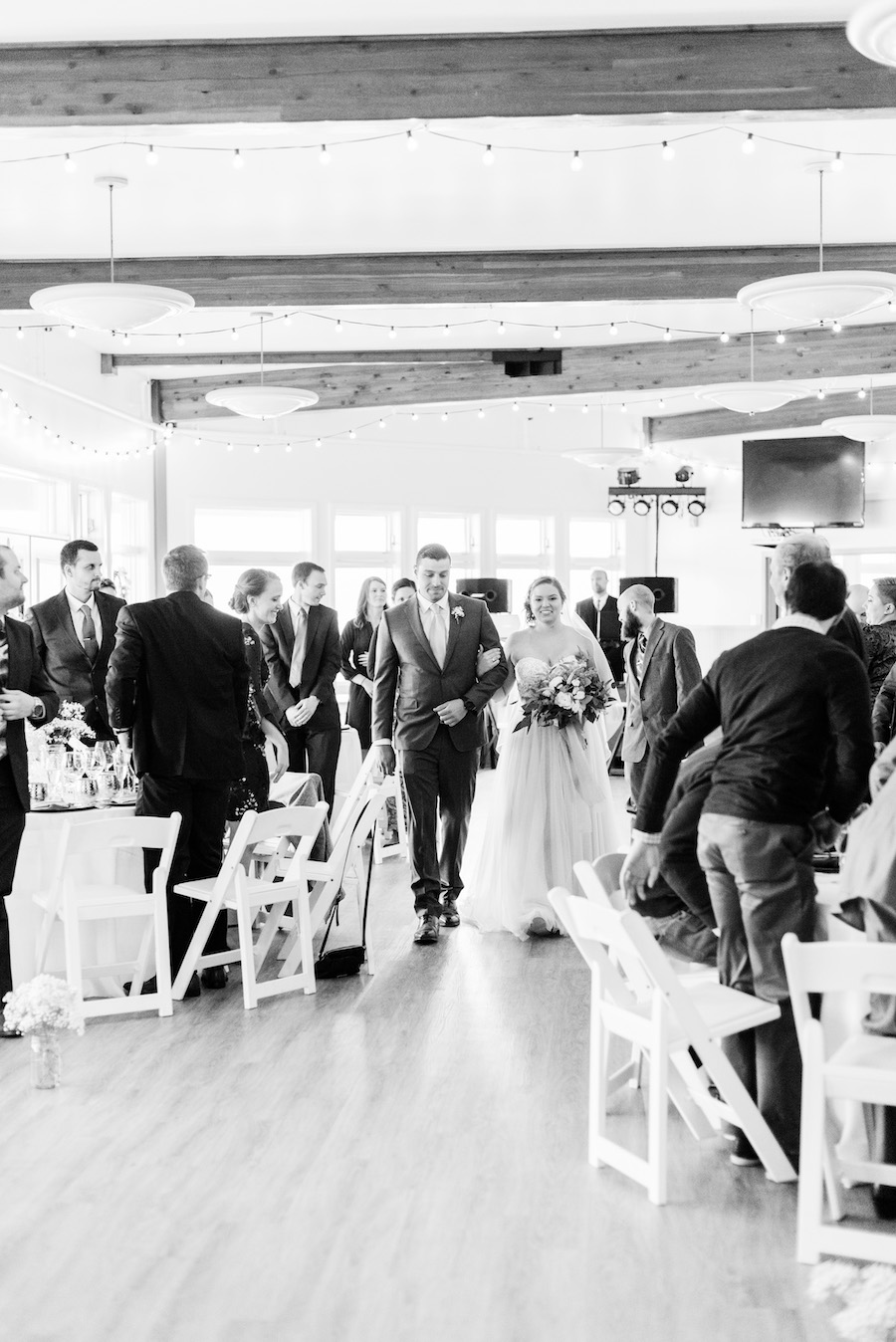 Bride walking down the aisle at her camp blodgett wedding