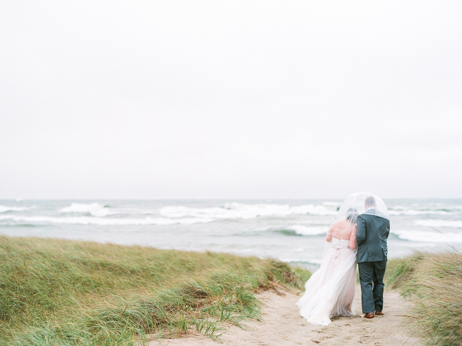 Newlyweds enjoying the views of Lake Michigan