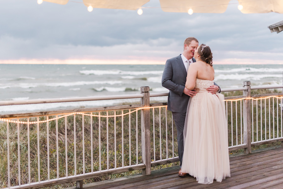 Newlyweds enjoy the sunset during their camp blodgett wedding