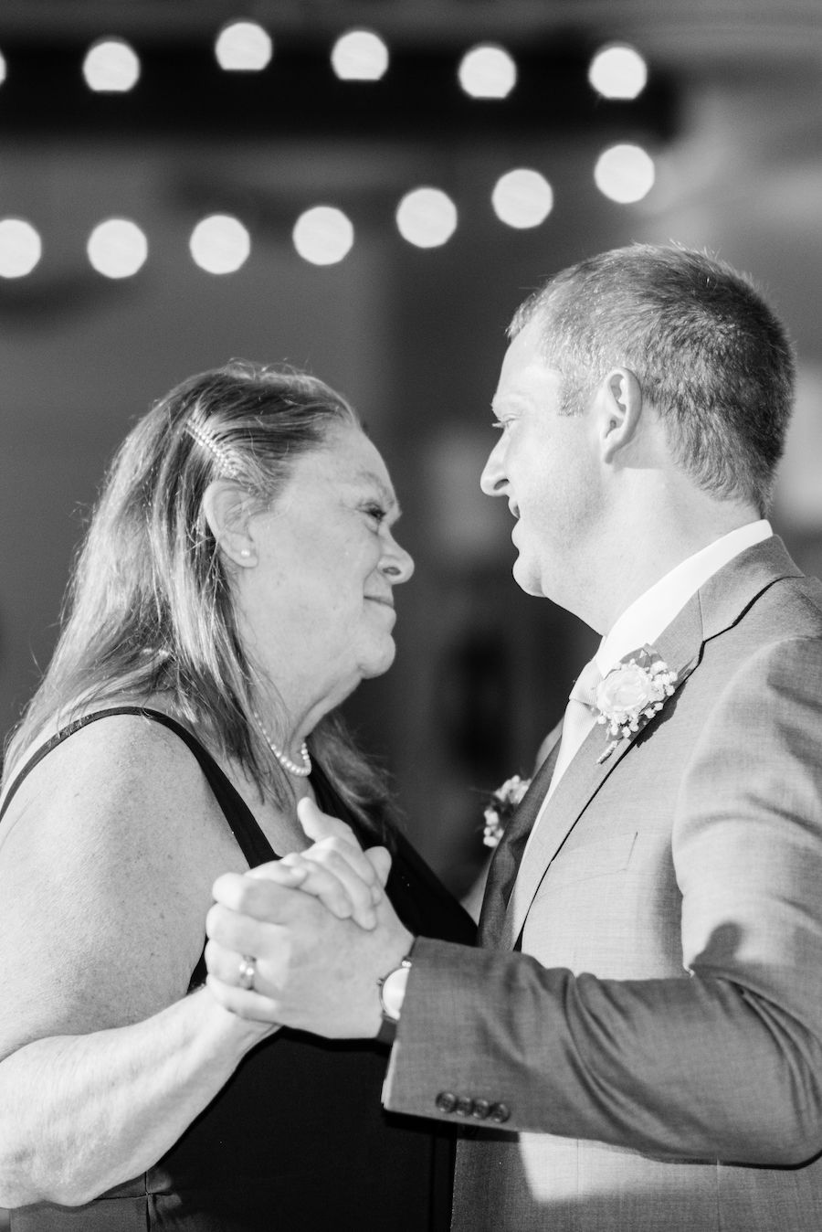 Groom and mother sharing a dance at his West Olive, Michigan wedding