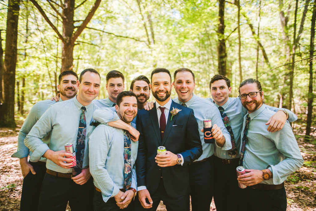 Groom and groomsmen smiling before Long Lake Outdoor Center Wedding
