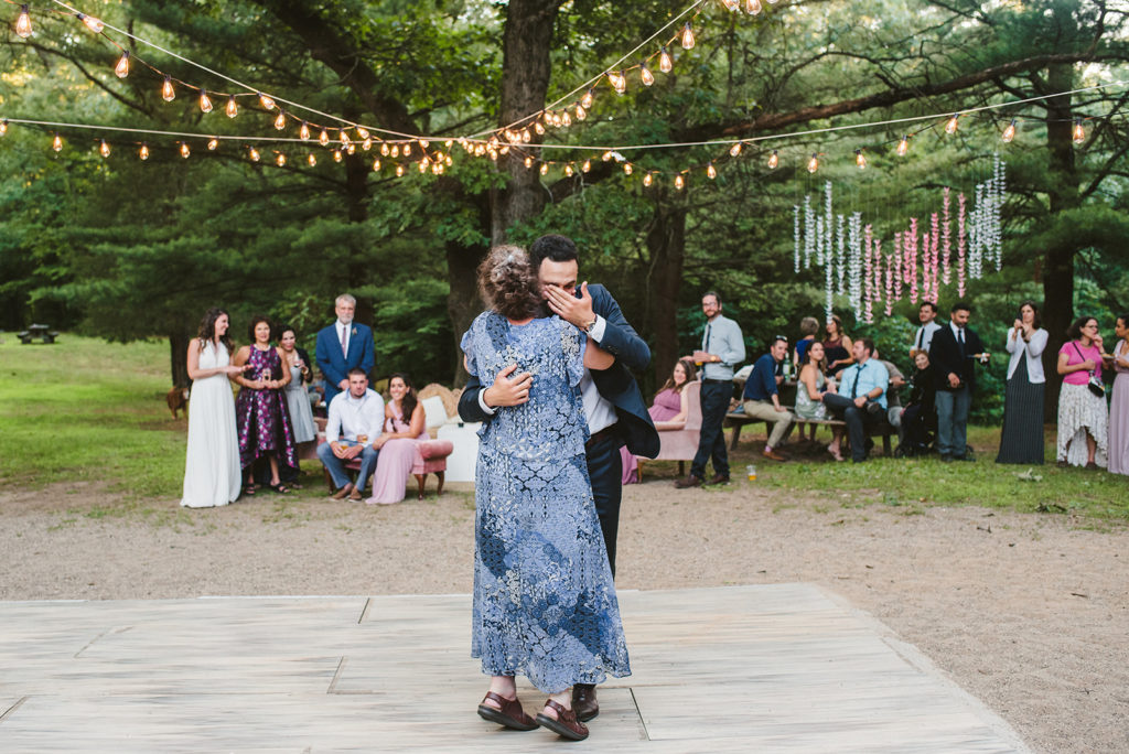 Groom and his mother share a dance at a Long Lake Outdoor Center wedding