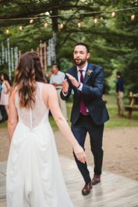 Bride and Groom share their first dance at their Long Lake Outdoor Center wedding