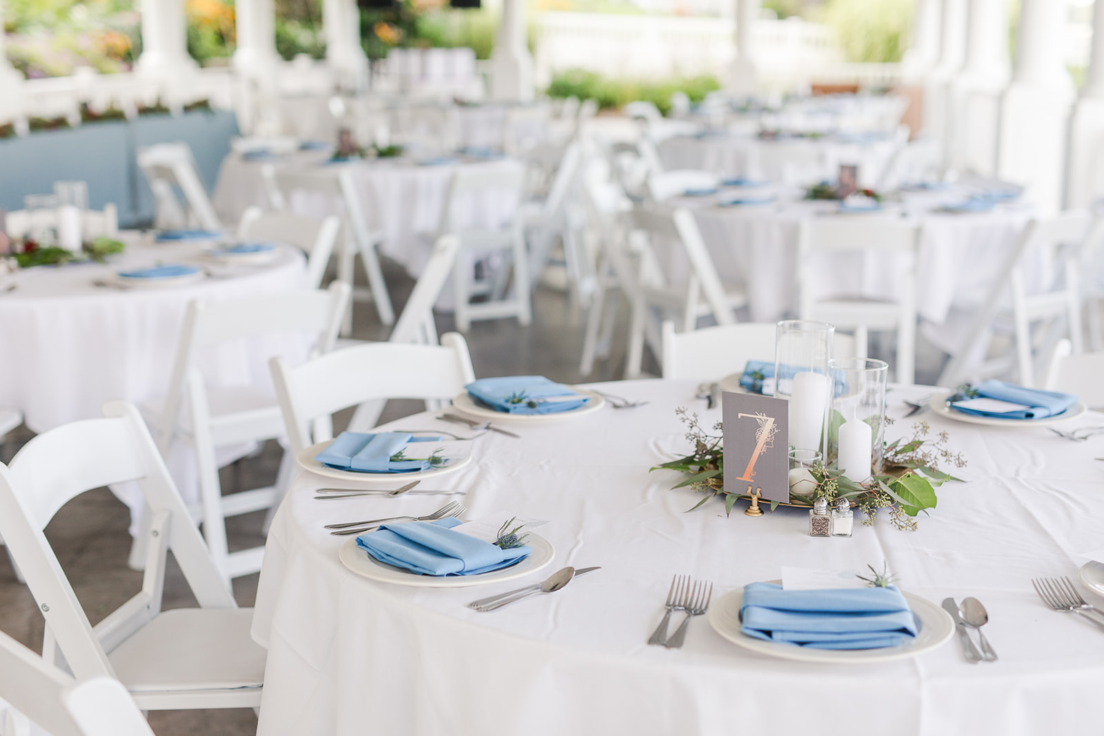 Tables set outside at a Bay Pointe Inn wedding in Shelbyville, Michigan