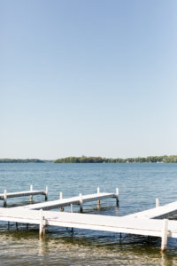 A summer day at the dock during a Bay Pointe Inn wedding in Shelbyville, Michigan