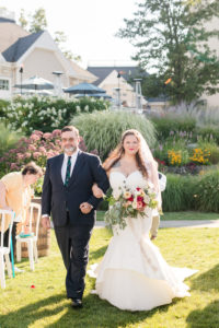 Bride and her father walking down the aisle 