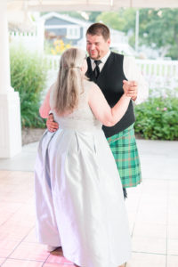 Mother and son smiling during their dance