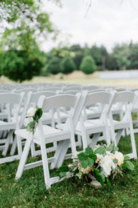 Ceremony chairs set on the felt estate before a wedding