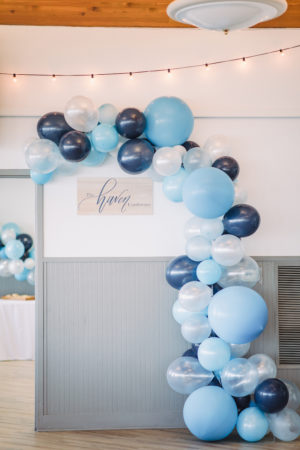 Blue balloon arch for The Haven Conference in West Olive, Michigan