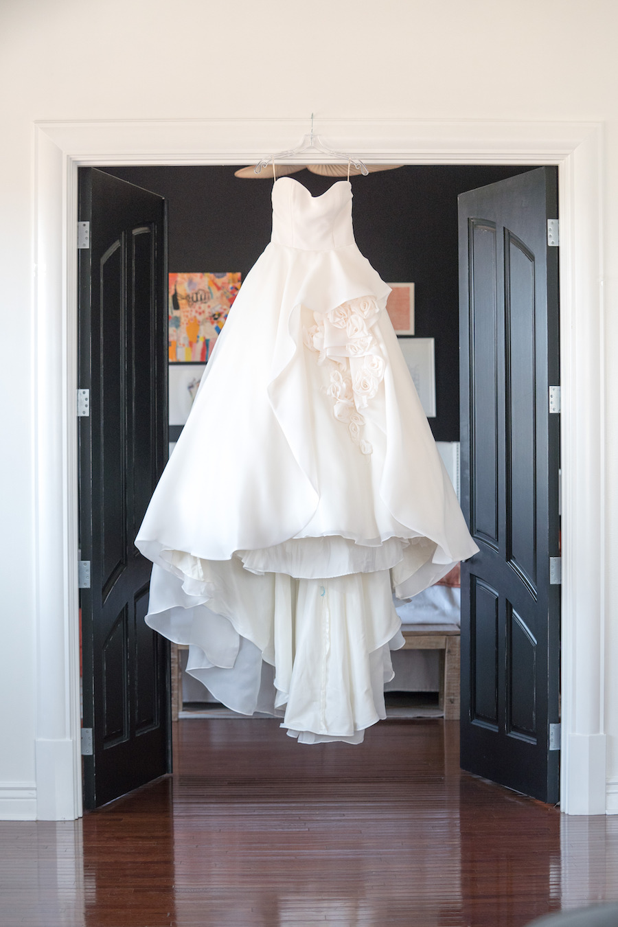 A wedding dress hanging at the penthouse at Loft 310