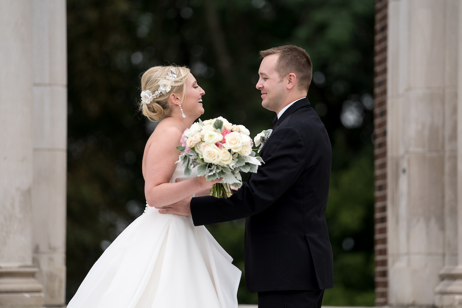 A bride and groom sharing a first look before their Kalamazoo, Michigan wedding