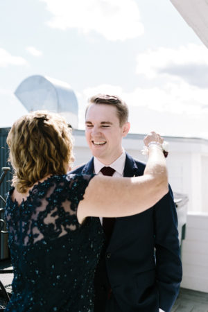 A groom and his mother before his Sky Deck wedding