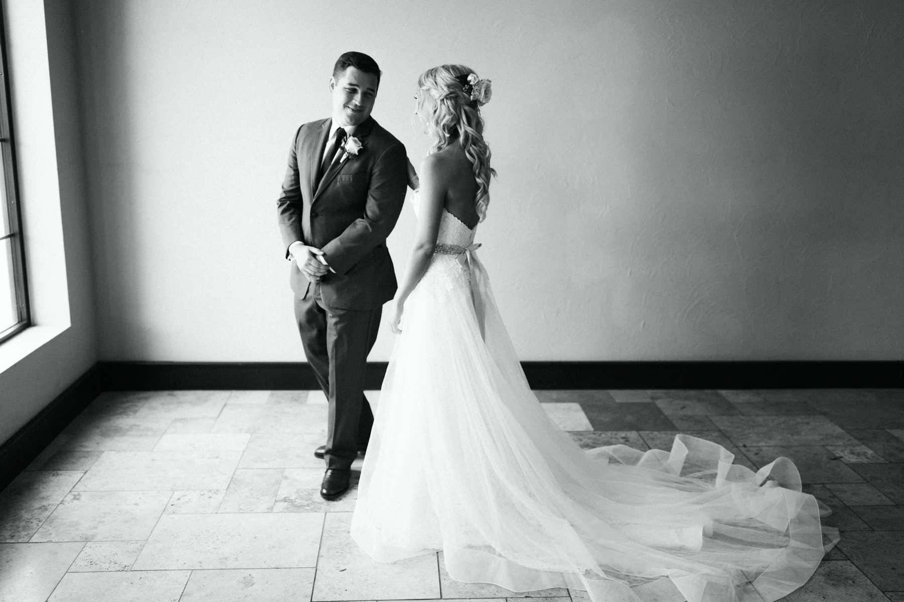 Bride and groom sharing a first look before their spring lake country club wedding
