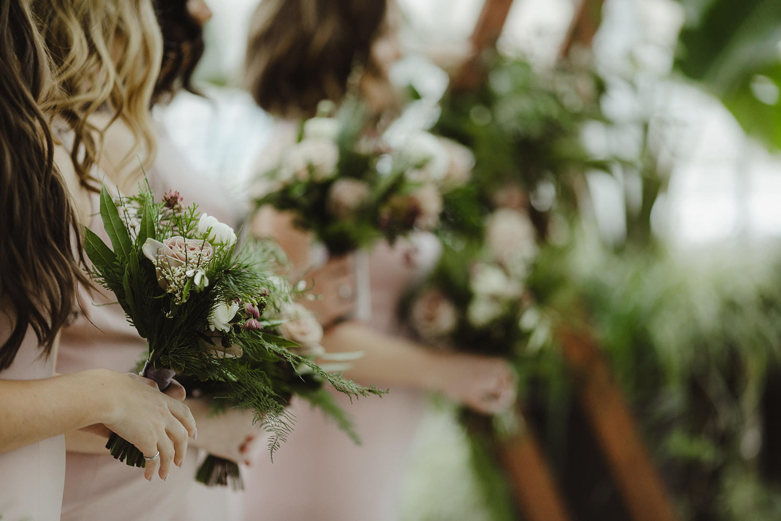 Bridesmaids holding their bouquets during a Grand Rapids, Michigan wedding