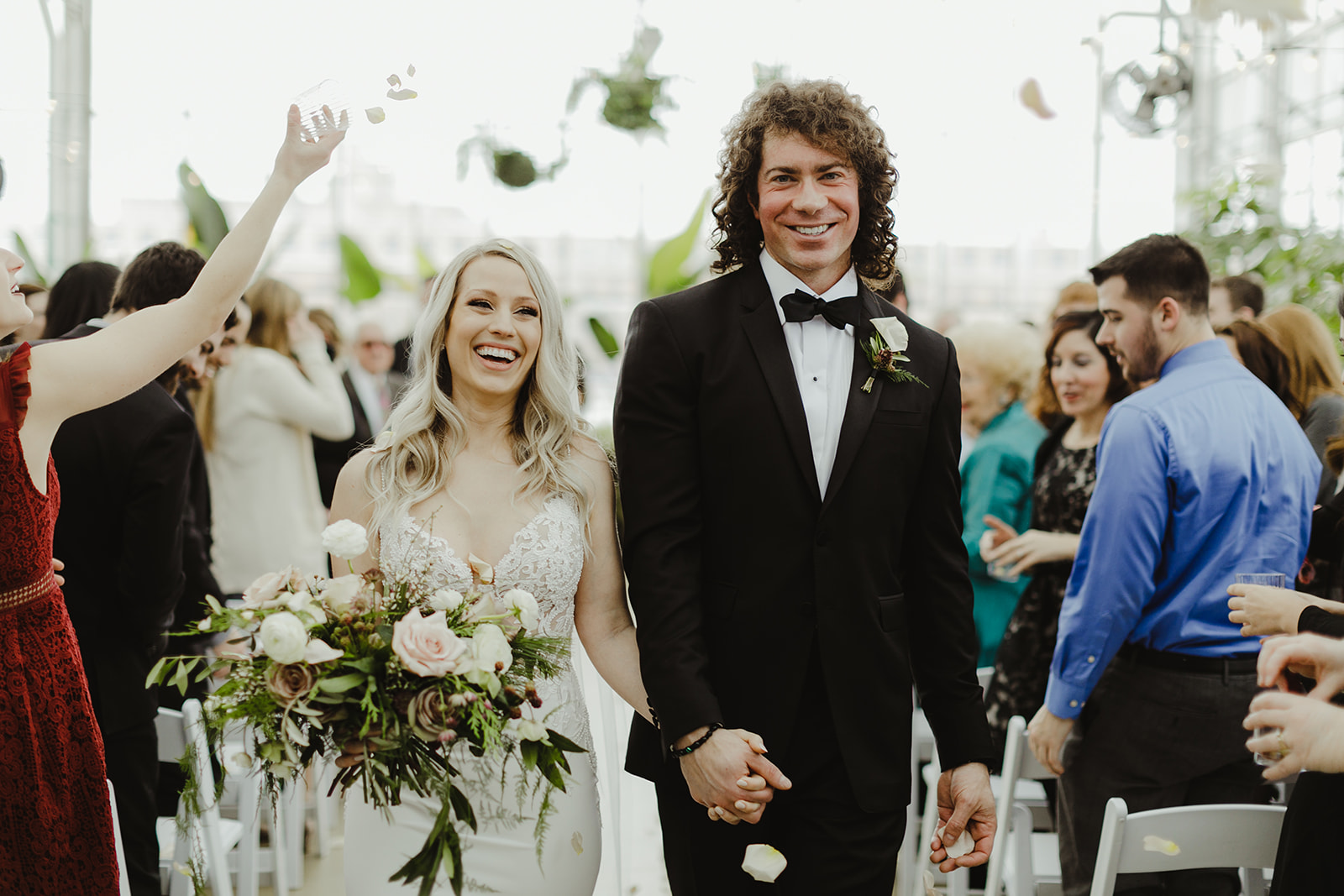 A couple smiling after their wedding ceremony