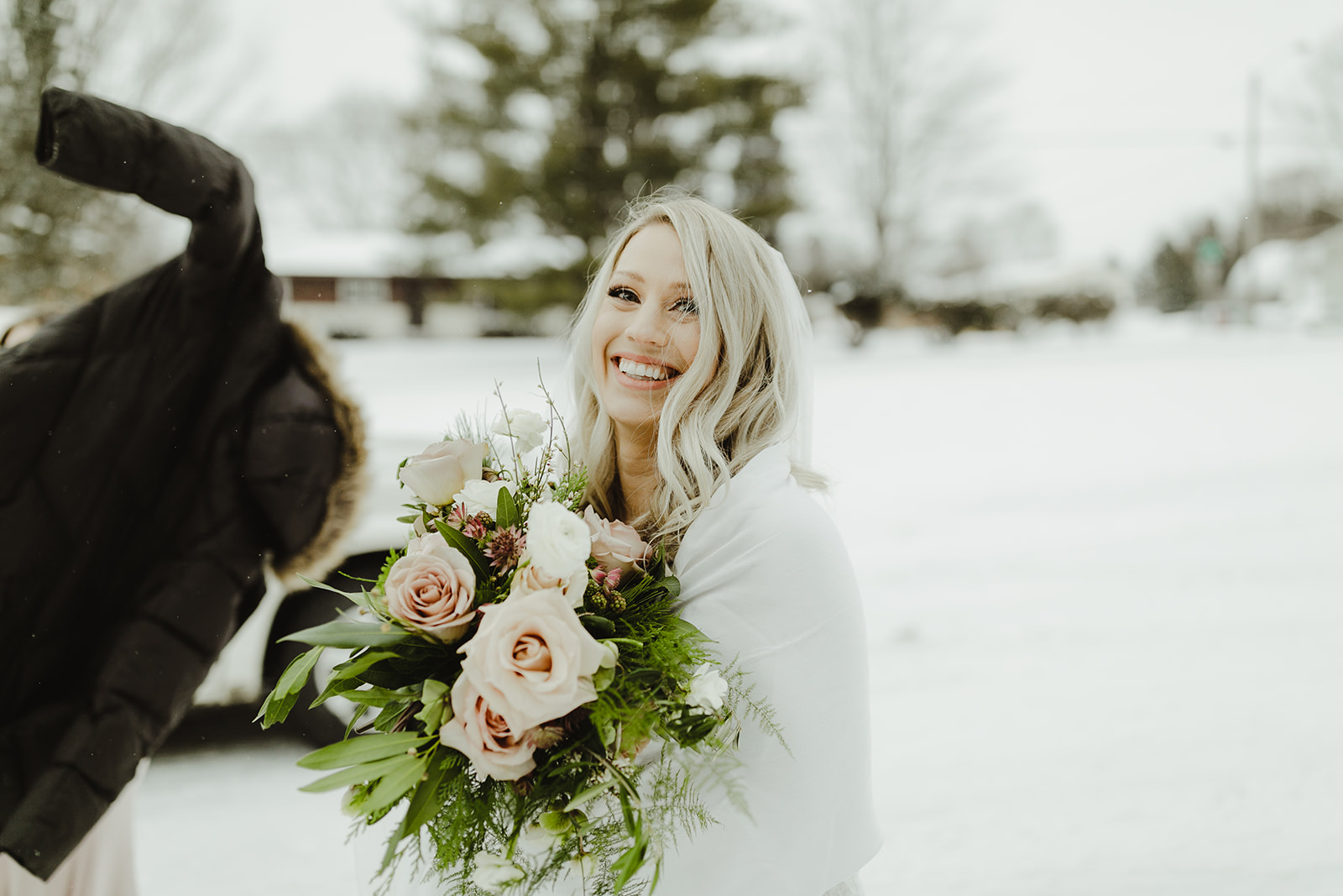 A bride smiling after her Grand Rapids, Michigan wedding