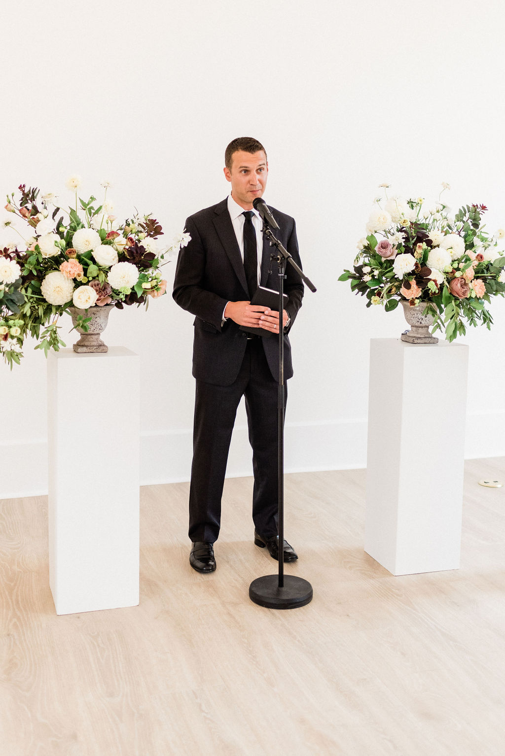 Officiant preforming a ceremony during a Kalamazoo, Michigan wedding