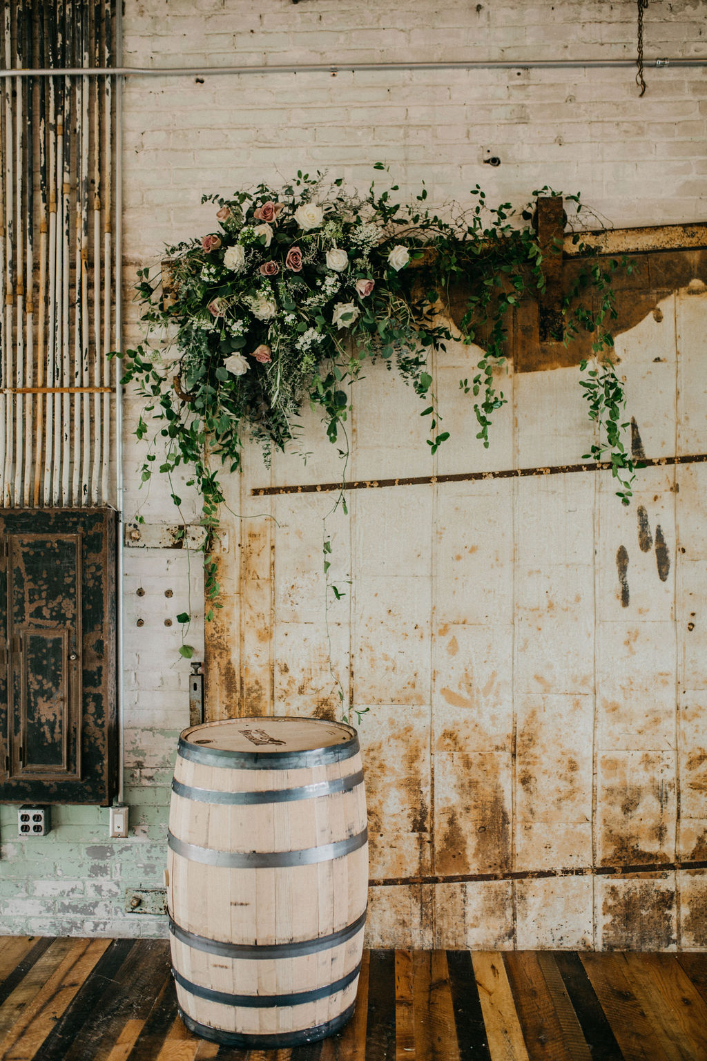 A flower arrangement on an old door