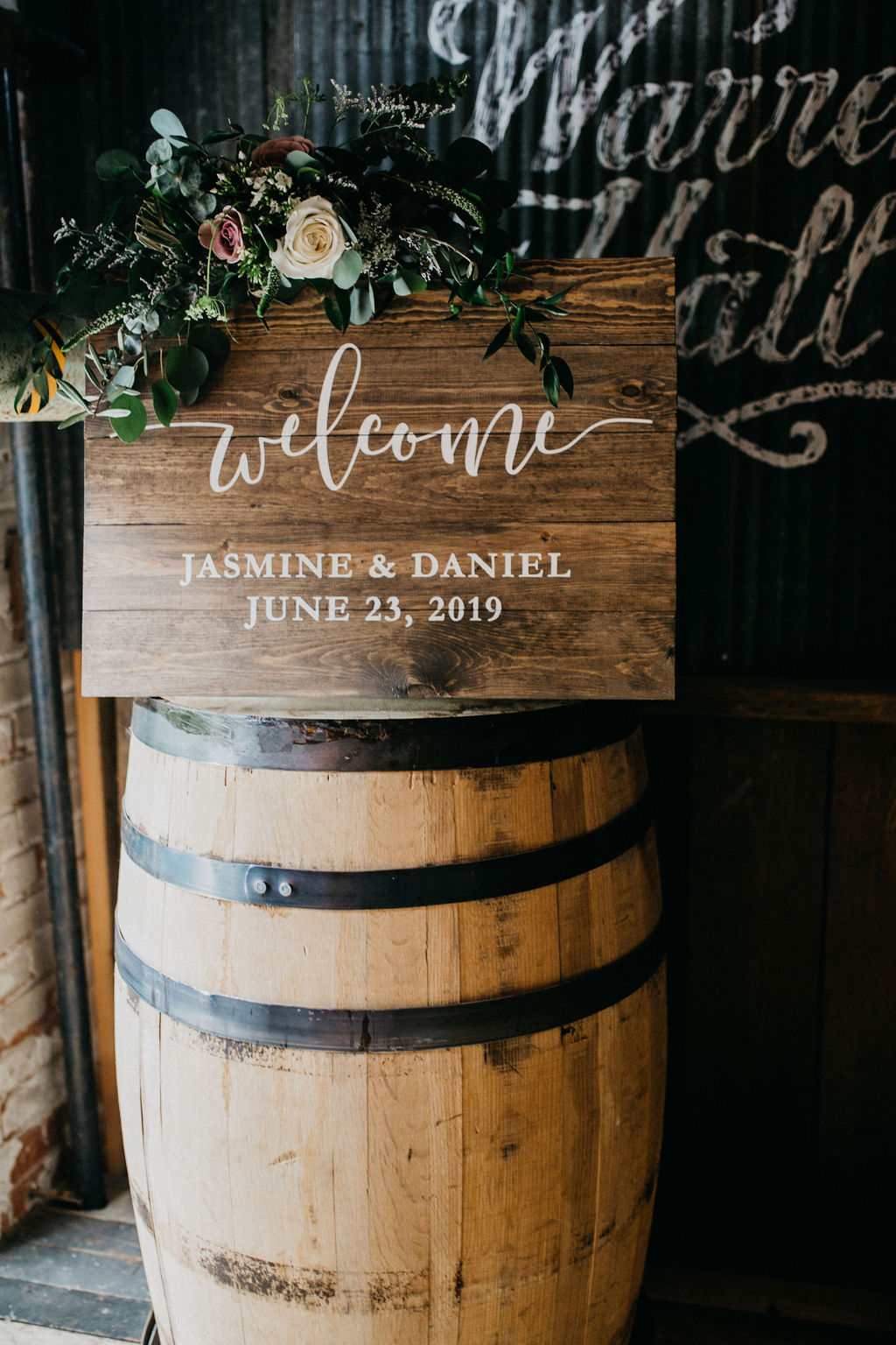 A wooden welcome sign