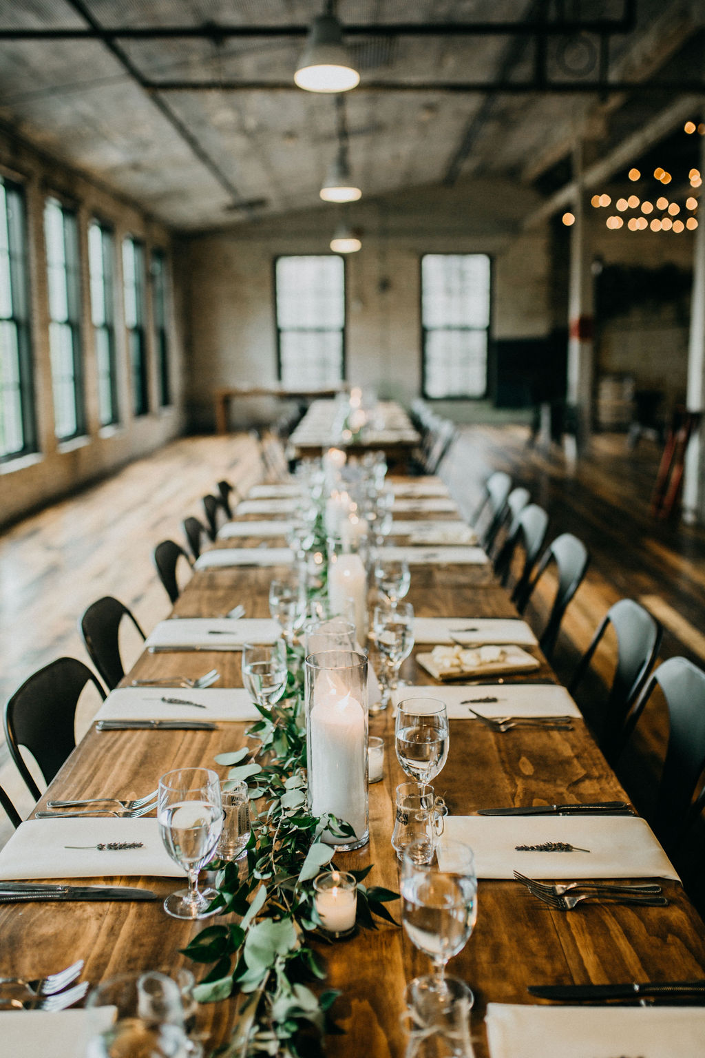 Tables set for a journeyman distillery wedding