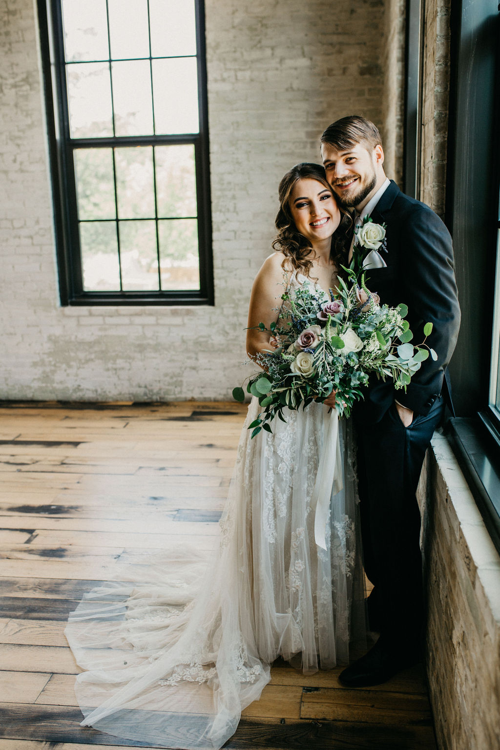 Couple smiling before their wedding