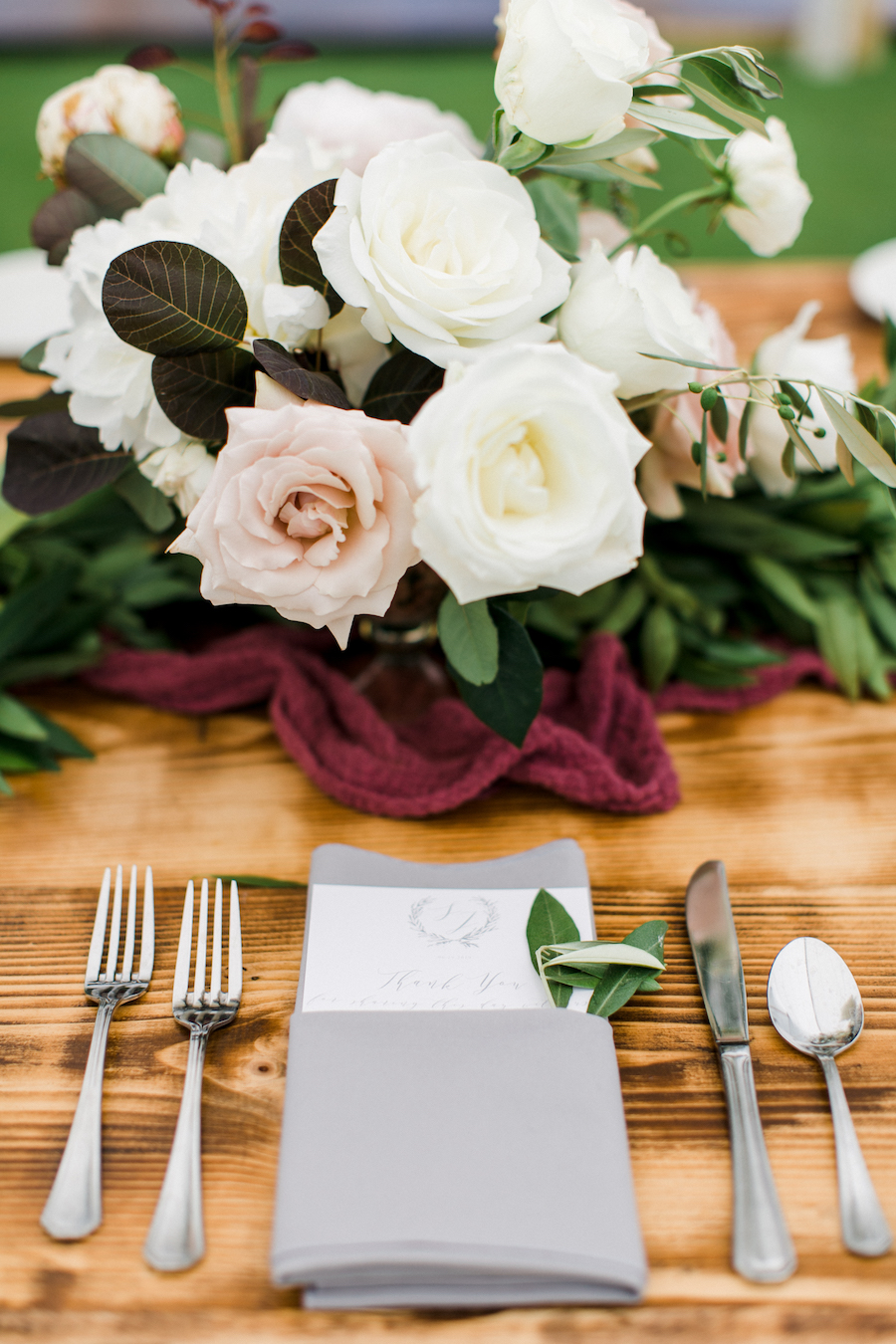 A blush and white table arrangement