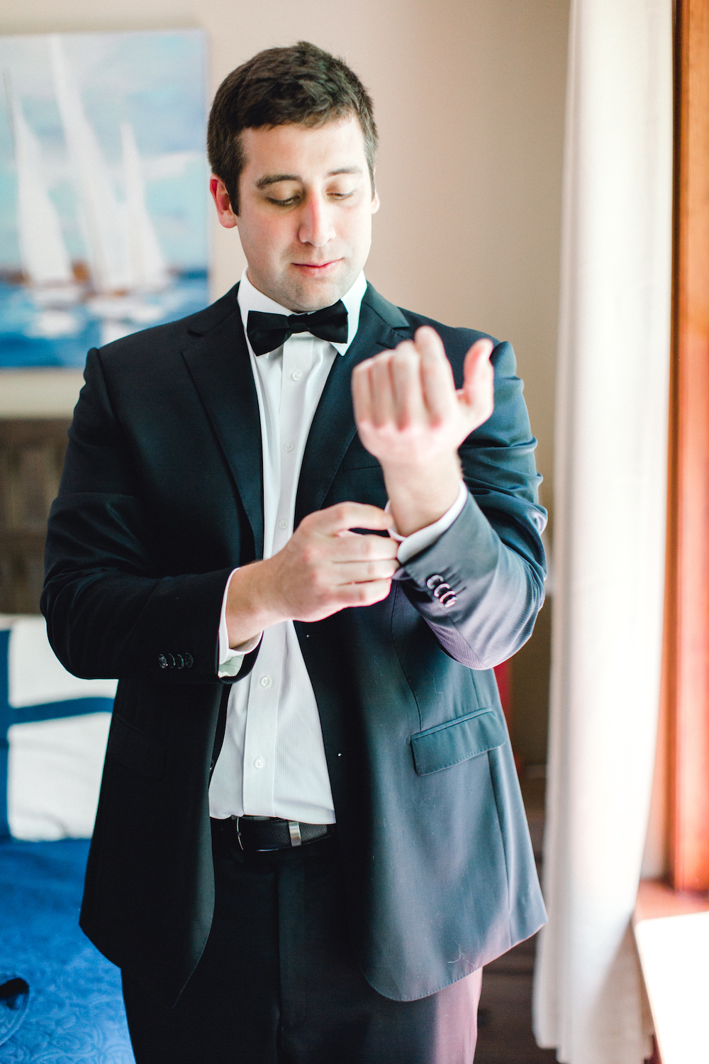 A groom getting ready on his wedding day