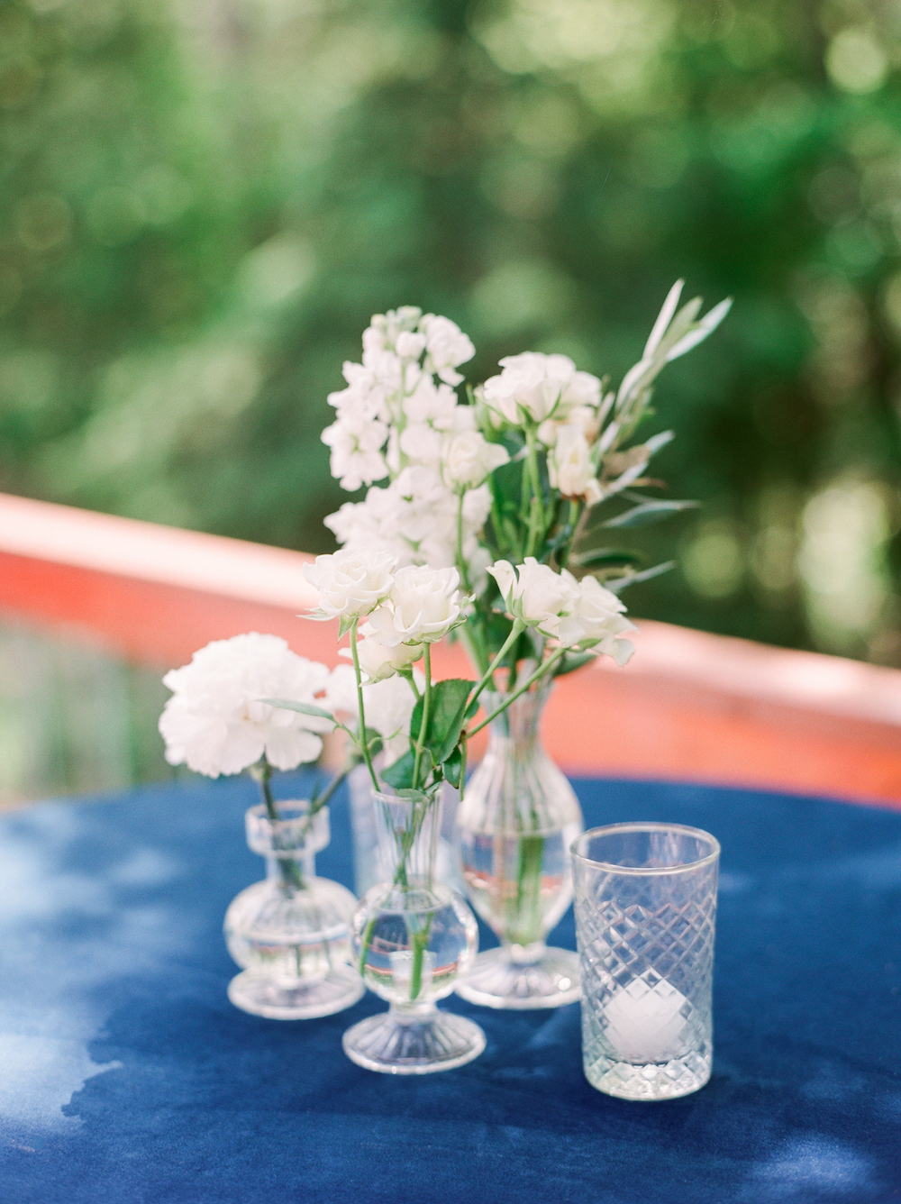 Bud vases on cocktail tables