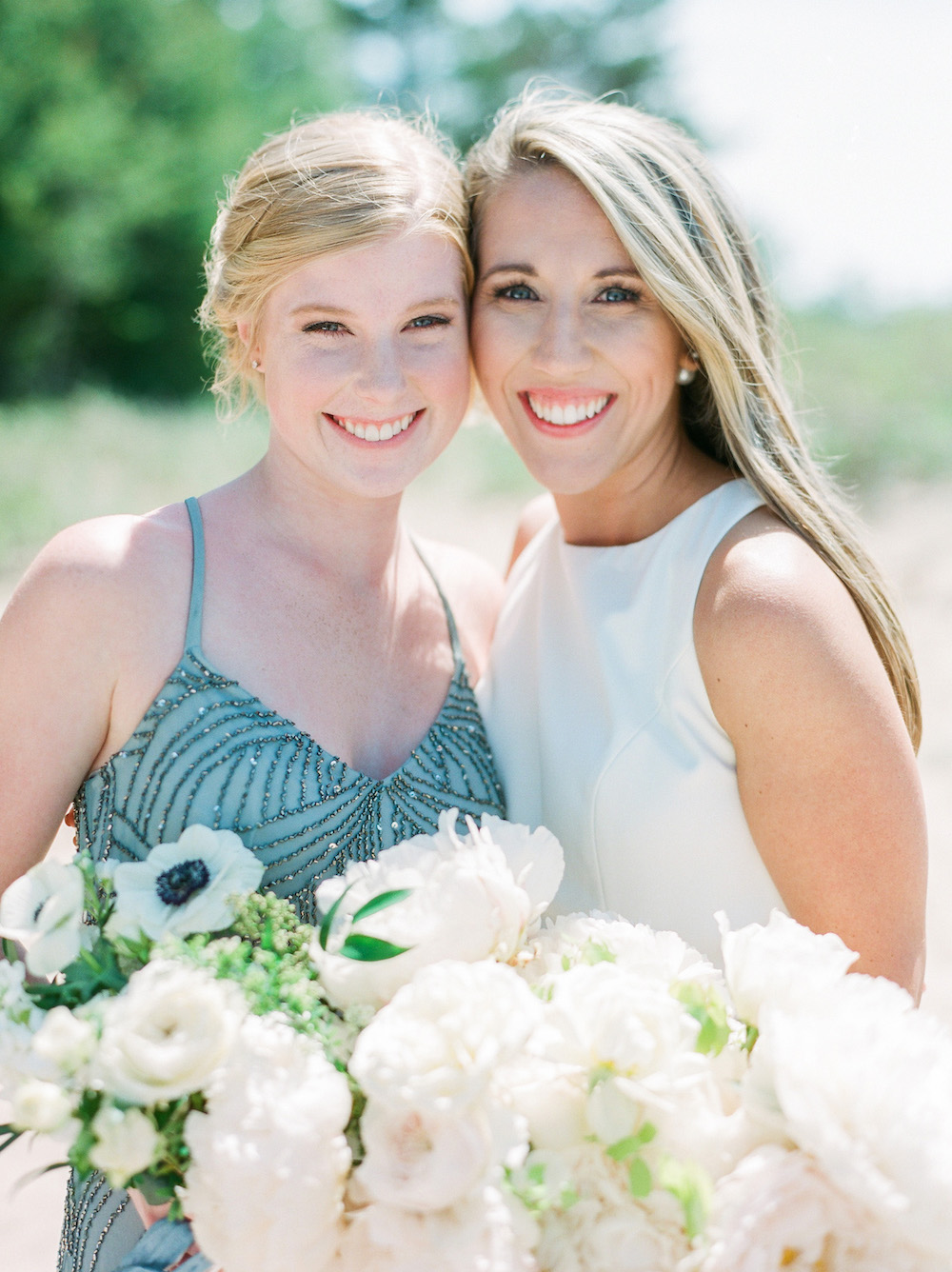 A bride and her bridesmaid