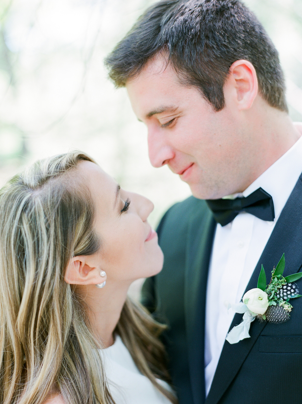 A couple smiling on their wedding day