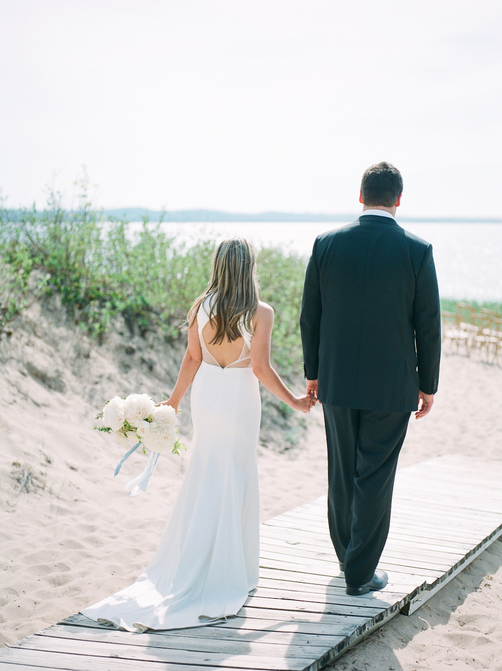 A couple during their Lake Michigan wedding