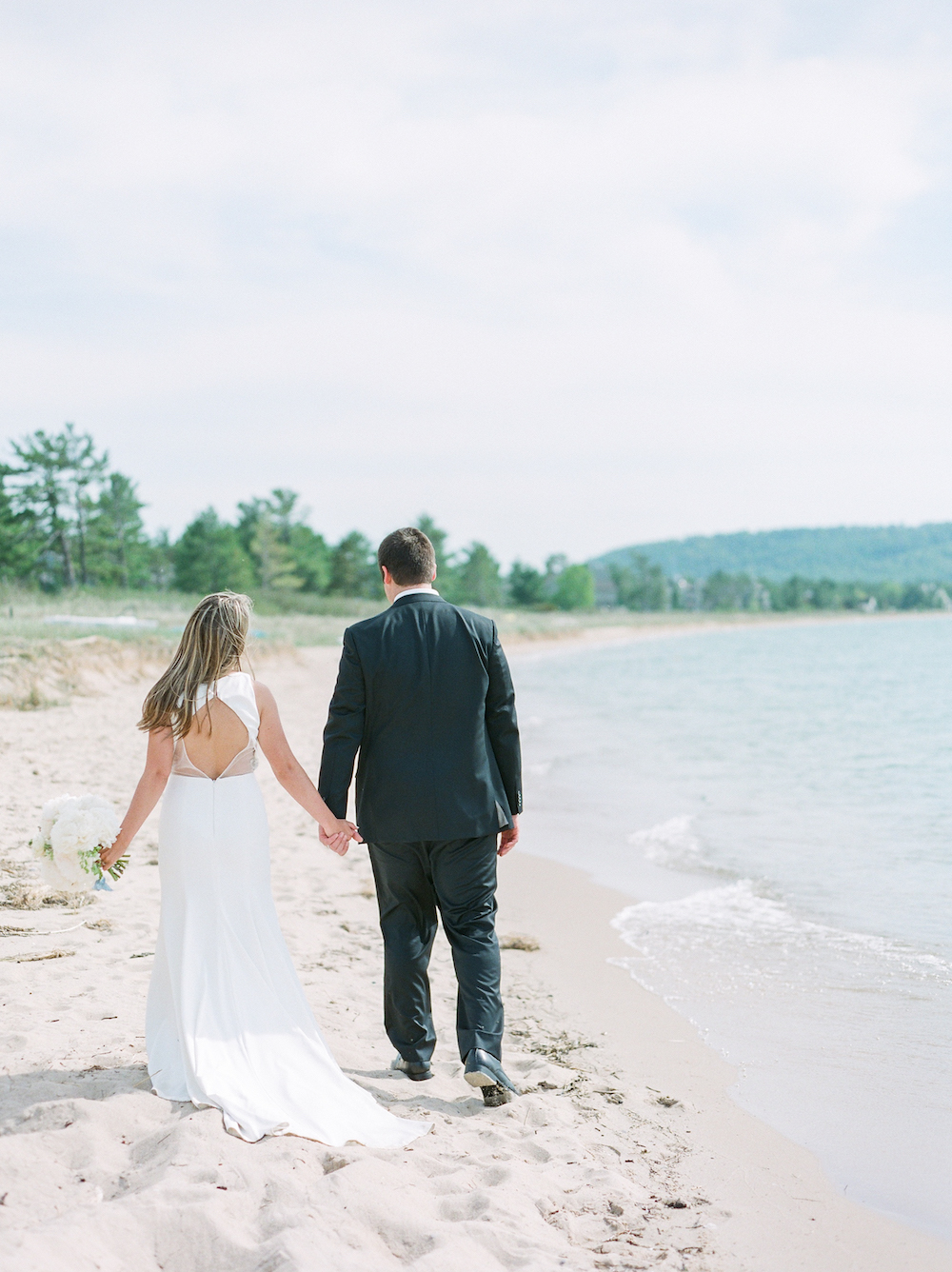 A couple walking on the beach