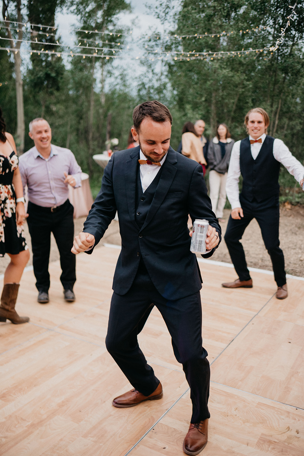 Groom enjoying his wedding reception