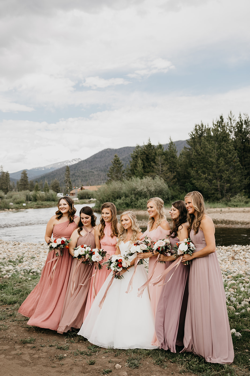 Bridesmaids smiling before a Rocky Mountain wedding