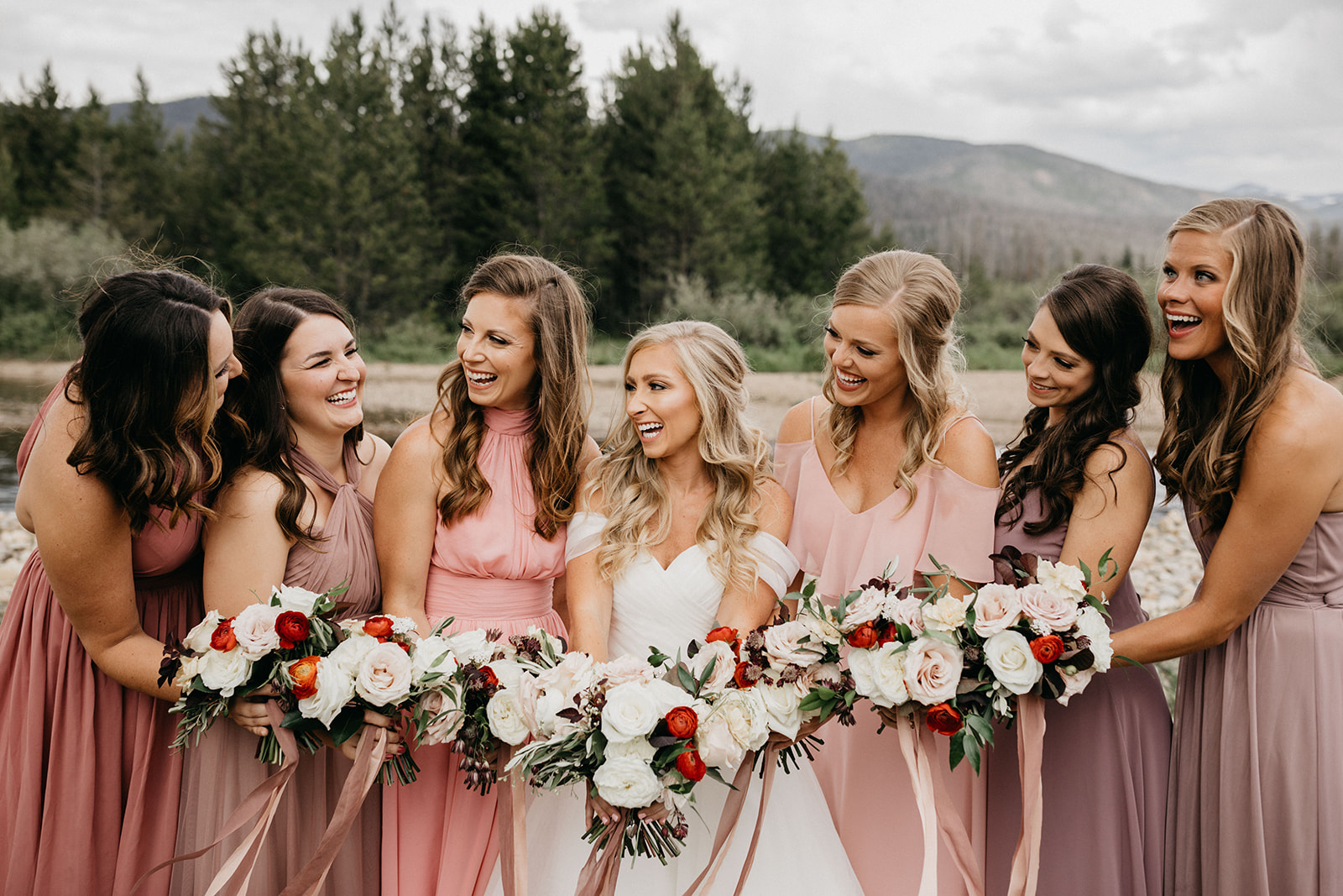 Bridesmaids smiling before a Grand Lake, CO wedding