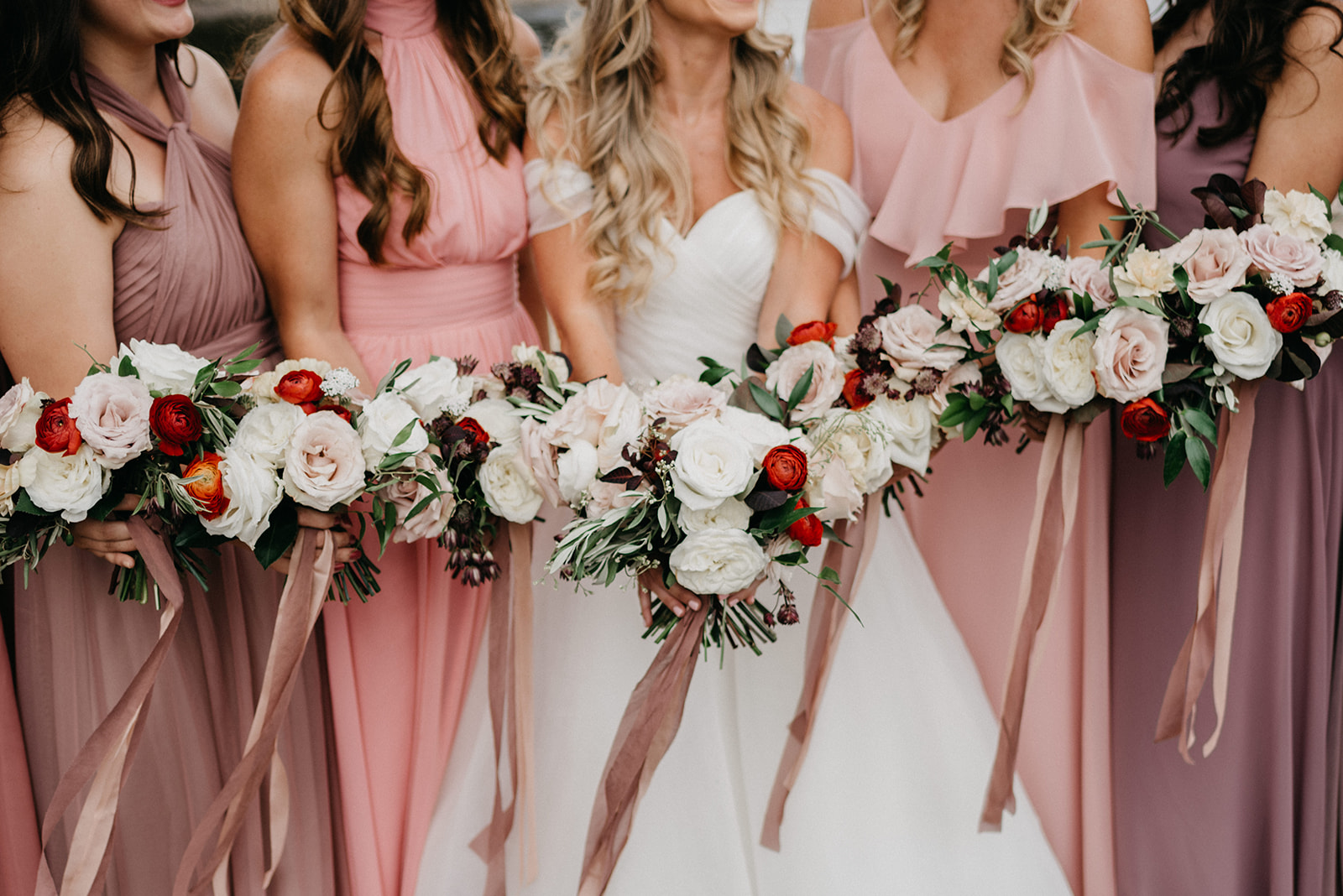 Bridesmaids and their bouquets